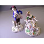 SITZENDORF PORCELAIN FIGURINES, a pair, modelled as a blue jacketed gallant and a bonneted young