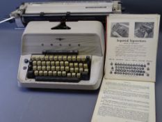 UNIVERSAL 20 TYPEWRITER BY ADLER with slipcover and Keyboard Education book