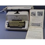 UNIVERSAL 20 TYPEWRITER BY ADLER with slipcover and Keyboard Education book