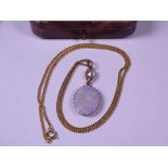 18CT GOLD NECKLACE with pear shape diamond and oval opal pendant drop, 26.5cms overall L, 8mm x