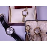 TWO VINTAGE 9CT GOLD CASED LADY'S WRISTWATCHES on expanding metal straps, one marked Accurist anti-