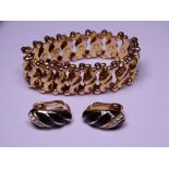 9CT GOLD EXPANDING BRACELET, 14.4grms and a pair of Christian Dior black enamel and yellow metal