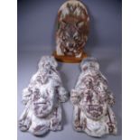 LEAD WALL PLAQUES, a pair depicting Greek military heads, 44cms H, and a Canadian wolf model by Paul