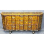 19TH CENTURY DUTCH MARQUETRY INLAID CHEST of three shaped drawers, urn and floral side panels