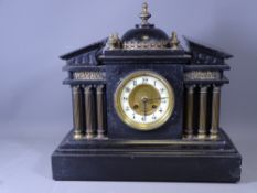 SLATE MANTEL CLOCK on a stepped base and finial top, 36cms H, 38cms W, 16cms D