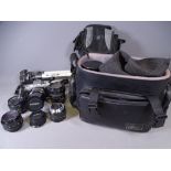 PHOTOGRAPHIC ITEMS - MINOLTA X-300, an assortment of lenses, a tripod and cases