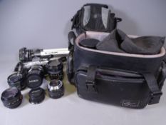 PHOTOGRAPHIC ITEMS - MINOLTA X-300, an assortment of lenses, a tripod and cases