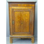 OAK STANDING CORNER CUPBOARD, single door with Sheraton type inlay, shaped interior shelves on