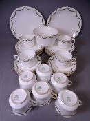 AYNSLEY CHRISTMAS GARLAND DESIGN TEAWARE, approximately 30 pieces