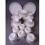 AYNSLEY CHRISTMAS GARLAND DESIGN TEAWARE, approximately 30 pieces