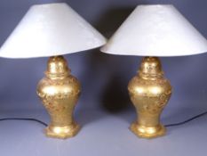 A PAIR OF ORNATELY PAINTED PORCELAIN TABLE LAMPS, a pair, 40cms H, no bulb, with shades