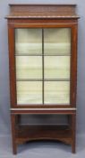 MAHOGANY CARVED RAILBACK DISPLAY CABINET, single door, carved edged detail with shaped lower