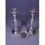 CIRCULAR BASED CANDLESTICKS, A PAIR and a small hallmarked silver pindish, 23cms H the candlesticks,