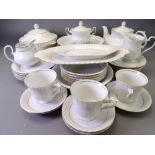 POLISH DINNERWARE in white with gilt edge, approximately 35 pieces