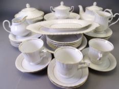 POLISH DINNERWARE in white with gilt edge, approximately 35 pieces