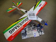 RADIO CONTROLLED AIRCRAFT, part assembled, with associated items labelled 'Boomerang TF4050' with
