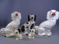 STAFFORDSHIRE DOGS, TWO PAIRS and a Black and White, 33cms the largest and a Ducal Sensor