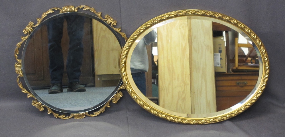 OVAL GILT FRAME BEVEL EDGE MIRROR, 51 x 60cms and a circular example, 51cms diameter