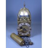 BRASS LANTERN CLOCK by Dent of London, single chain weight and Roman numeral dial, 39cms H