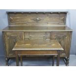 OAK CARVED RAILBACK SIDEBOARD with three central drawers and two flanking cupboards
