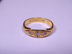 22CT GOLD RING set with three small diamonds, size mid S-T, 6.5grms