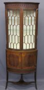 FLOOR STANDING MAHOGANY INLAID CORNER DISPLAY CUPBOARD, twin curved glazed upper doors with fretwork