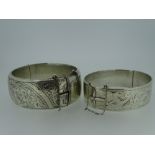 VINTAGE SILVER BANGLES (2), one London 1959 of hinged ornate form and one Birmingham 1960 of