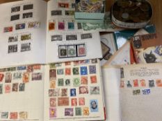 STAMPS - Junior albums, a miscellaneous assortment and loose, also a small parcel of currency