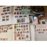 STAMPS - Junior albums, a miscellaneous assortment and loose, also a small parcel of currency