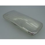 SILVER GLASSES CASE with sprung lid bearing crown and crescent marks for German silver of 935 grade,
