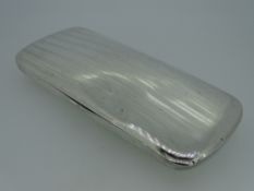 SILVER GLASSES CASE with sprung lid bearing crown and crescent marks for German silver of 935 grade,