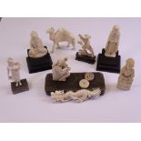 EARLY 20TH CENTURY ORIENTAL/INDIAN CARVED IVORY GROUP OF FIGURINES, various measurements