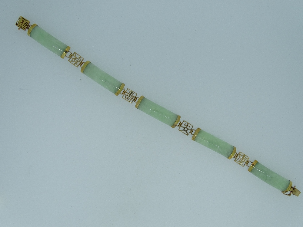 9CT GOLD & GREEN JADE BRACELET made up of five long shaped panels of pale green Chinese Jade