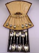 7 PIECE ART DECO TEASPOON & SUGAR TONGS SET, CASED, Birmingham 1922, a single silver teaspoon and