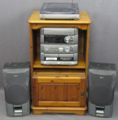 AIWA STEREO SOUND SYSTEM WITH SPEAKERS in a modern pine entertainment cabinet, 99cms H, 57cms W,