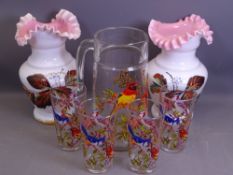 MILK GLASS VASES, a pair, 20cms tall and tropical bird decorated glass lemonade set