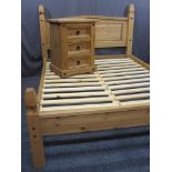 MODERN PINE 4FT 6INS BED FRAME with matching three drawer bedside chest, 116cms max H, 148cms max W,