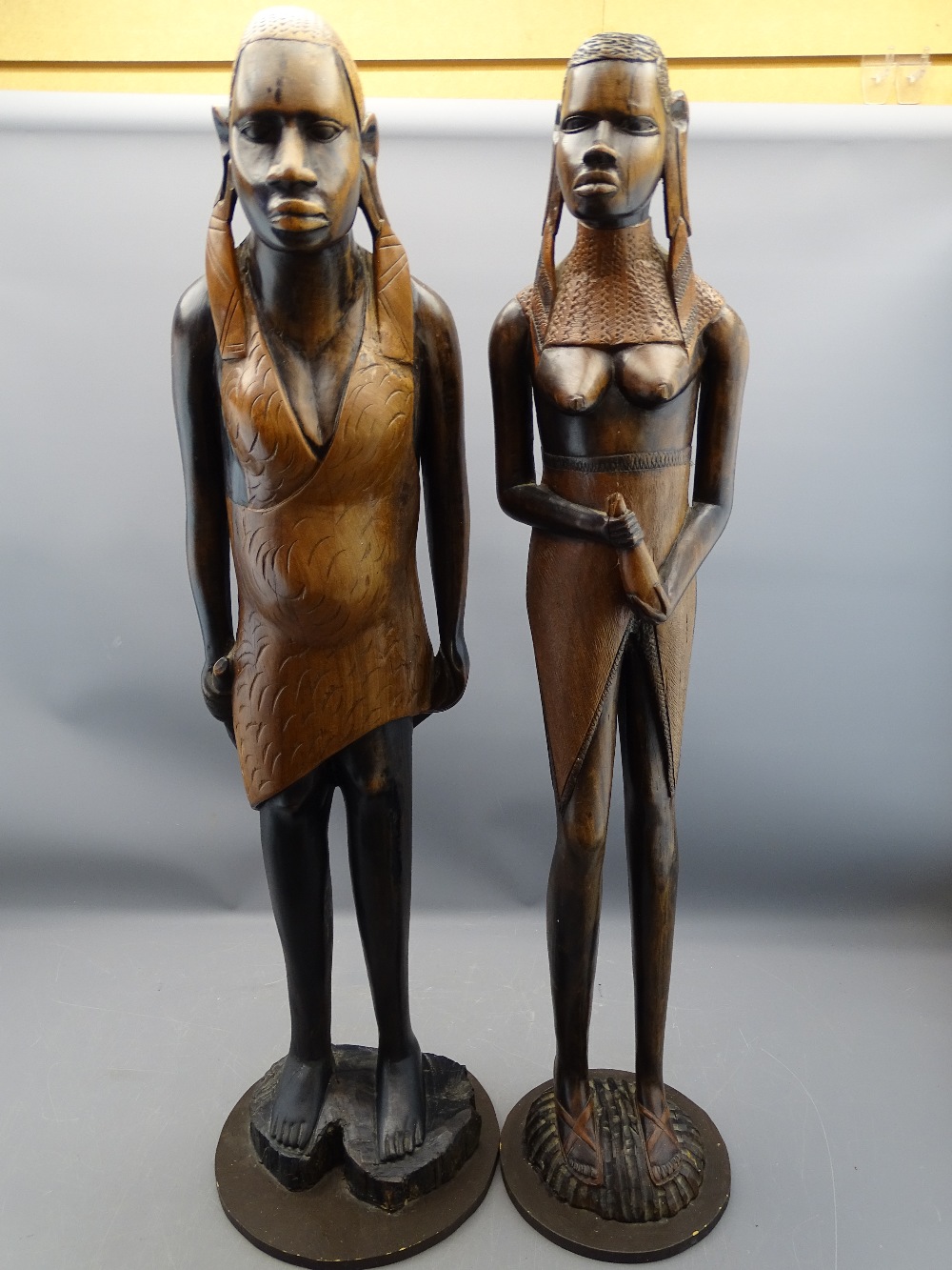 AFRICAN WOODEN CARVED FIGURES - two females, 96cms H the tallest
