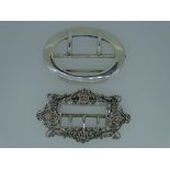 SILVER LARGE BELT BUCKLES (2), one ornate scrolls and garlands pattern, London 1894 by William