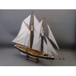 MULTI-SAIL POND YACHT on wooden stand, 66cms H x 75cms L