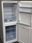 FRIDGE/FREEZER by Ice King model No IK9055APZ, 130cms H, 50cms W, 58cms D