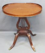 REPRODUCTION MAHOGANY TRAY TOP SIDE TABLE on a carved lyre support and carved knee four footed base,