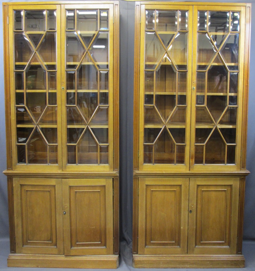 TWIN MAHOGANY GLAZED TOP BOOKCASES, 199.5cms H, 87cms W, 40cms Dboth having double