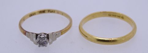 22CT & 18CT GOLD RINGS (2), the 22ct gold wedding band size mid M - N, 2.8grms, 18ct size N with a