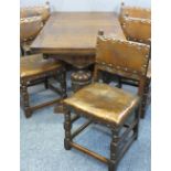 EXCELLENT QUALITY OAK DRAW LEAF DINING TABLE and five leather seated dining chairs, the table with