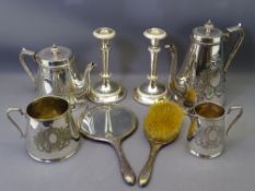 EPNS - four piece tea service, a pair of candleholders and silver dressing table items