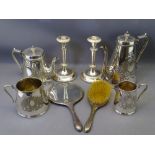 EPNS - four piece tea service, a pair of candleholders and silver dressing table items