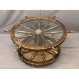 OCCASIONAL FURNITURE - circular coffee table in the form of a ship's wheel, glass insert and lower