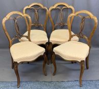 SET OF FOUR WALNUT PARLOUR CHAIRS having shaped crests and carved detail to the backs with stuff