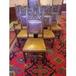 SET OF 11 CONTINENTAL CAROLEAN STYLE OAK DINING CHAIRS with carved mask crest rails and front